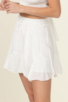 NOT YOUR GIRL DRAWSTRING RUFFLED MINI SKIRT